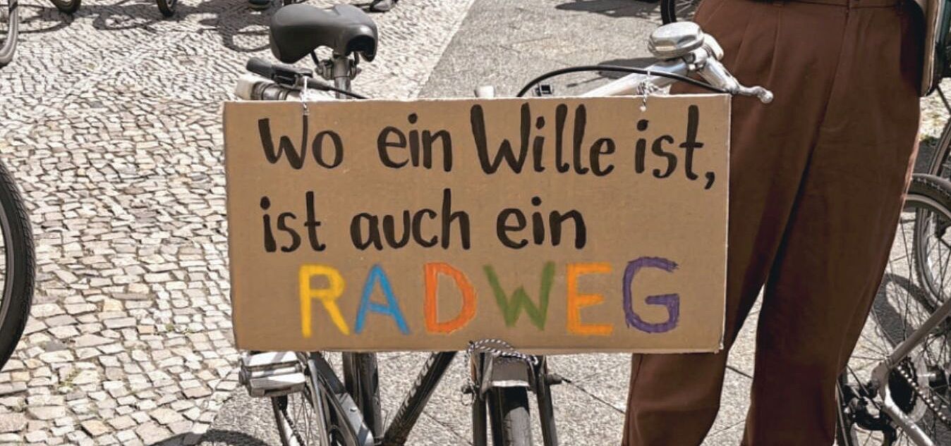 Schild: Wo ein Wille ist, ist auch ein Radweg