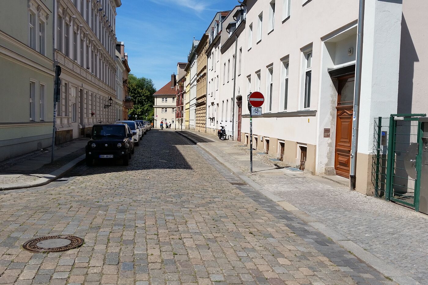 a Möllentordamm mit Felgenbrecherkopfsteinpflaster.
